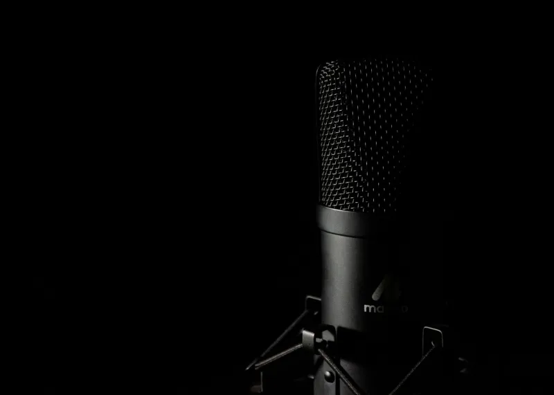 Unmuted: Why Britain's Senior Executives Are Surrendering the Podcast Stage to Their Competitors